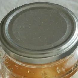 A 261 pixel square of the lid from x=315, y=129, the label outside and the lid the same 261 by 186