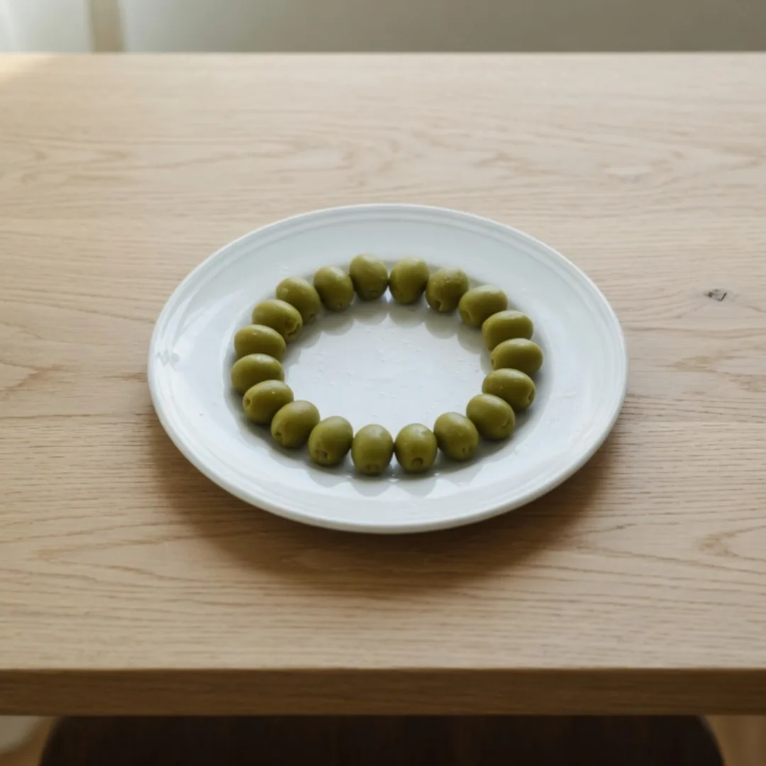 A 1080 by 1080 crop from the center of the table. The plate is still round, and the cup and napkin are gone