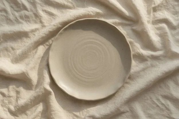 The same plate scaled to 624 by 416, both axes halved, the rim still a circle